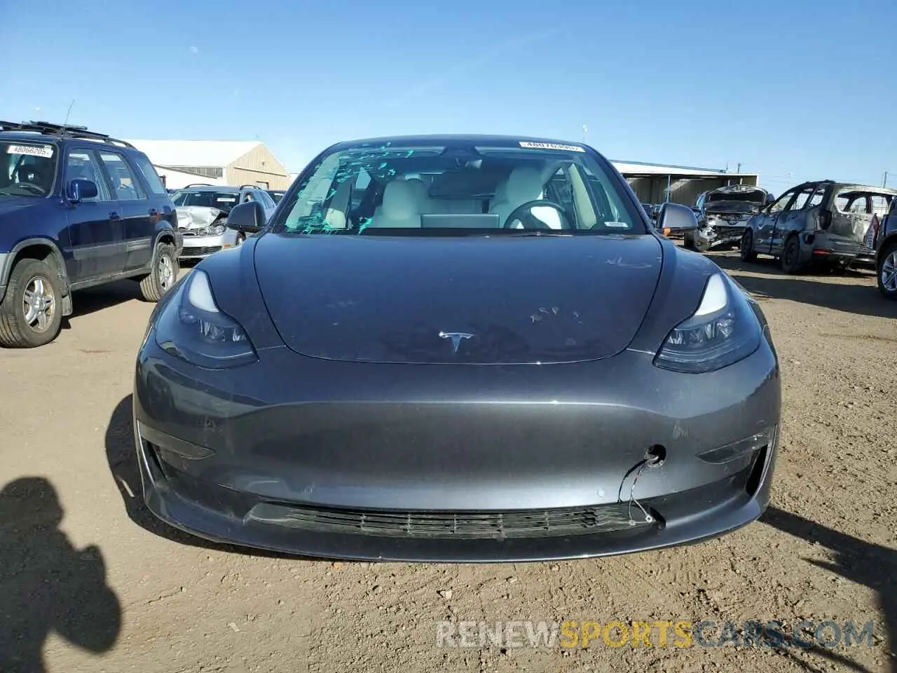 5 Photograph of a damaged car 5YJ3E1EB1NF270328 TESLA MODEL 3 2022