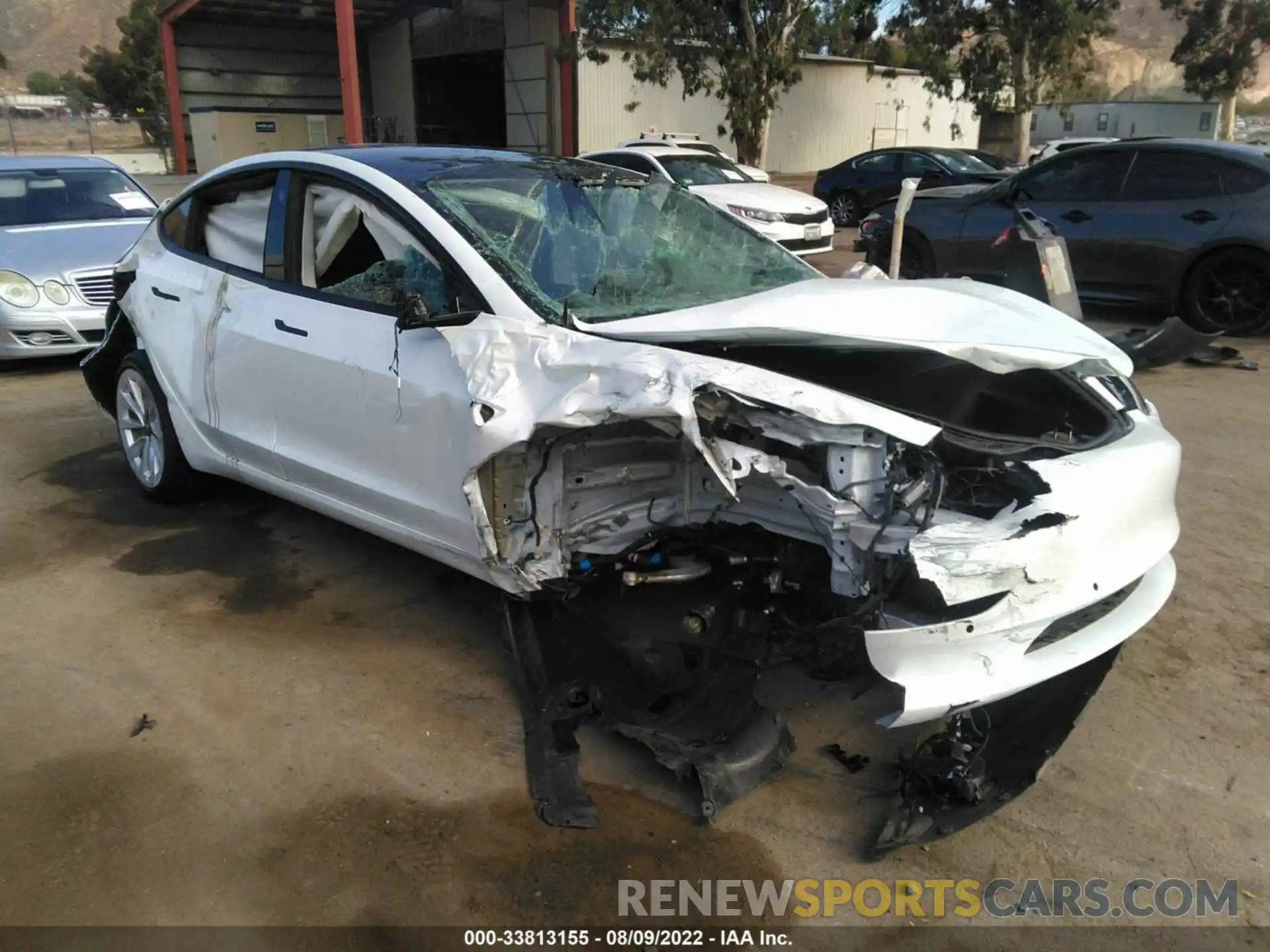 1 Photograph of a damaged car 5YJ3E1EB1NF272581 TESLA MODEL 3 2022