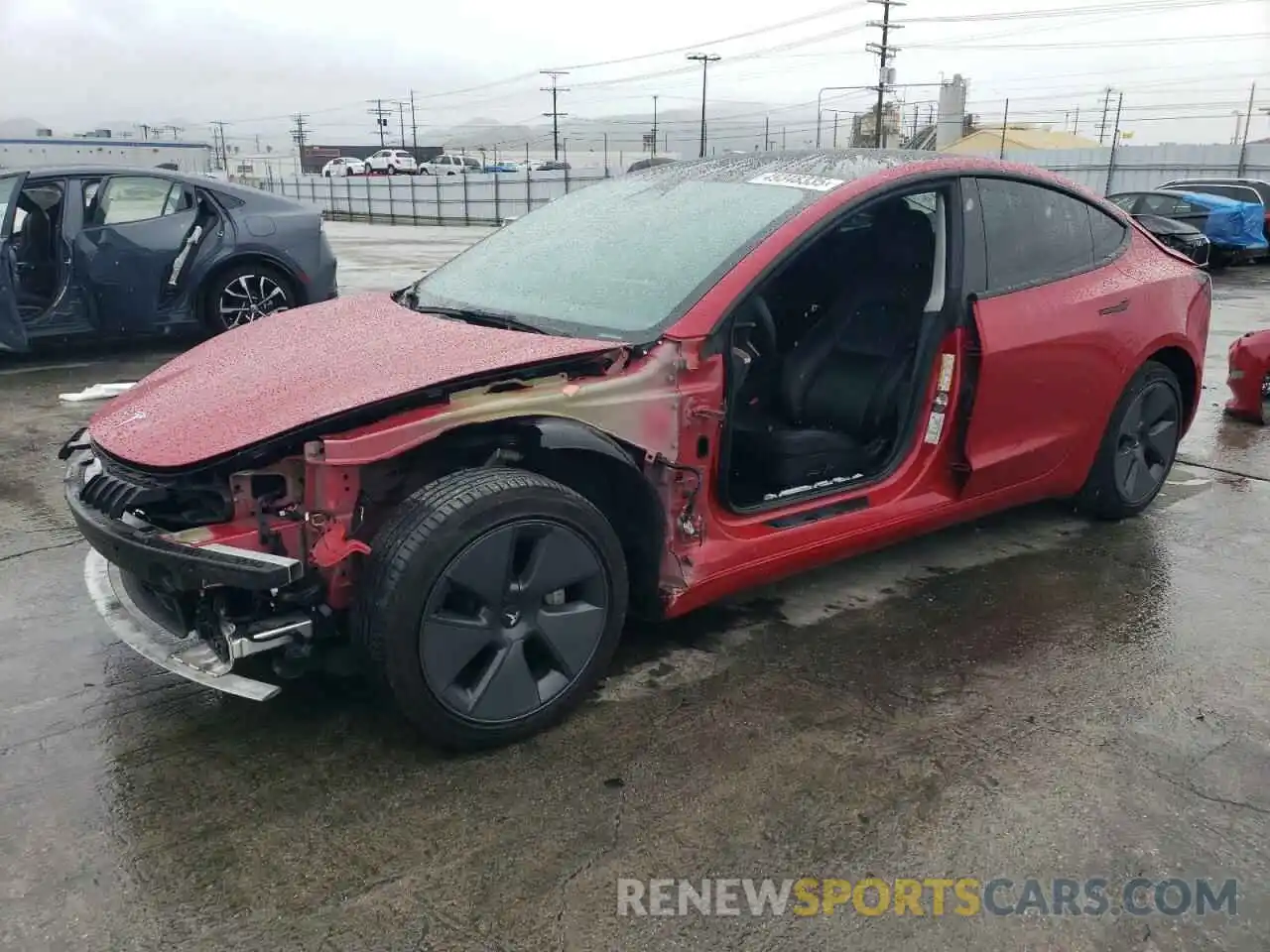 1 Photograph of a damaged car 5YJ3E1EB1NF273763 TESLA MODEL 3 2022