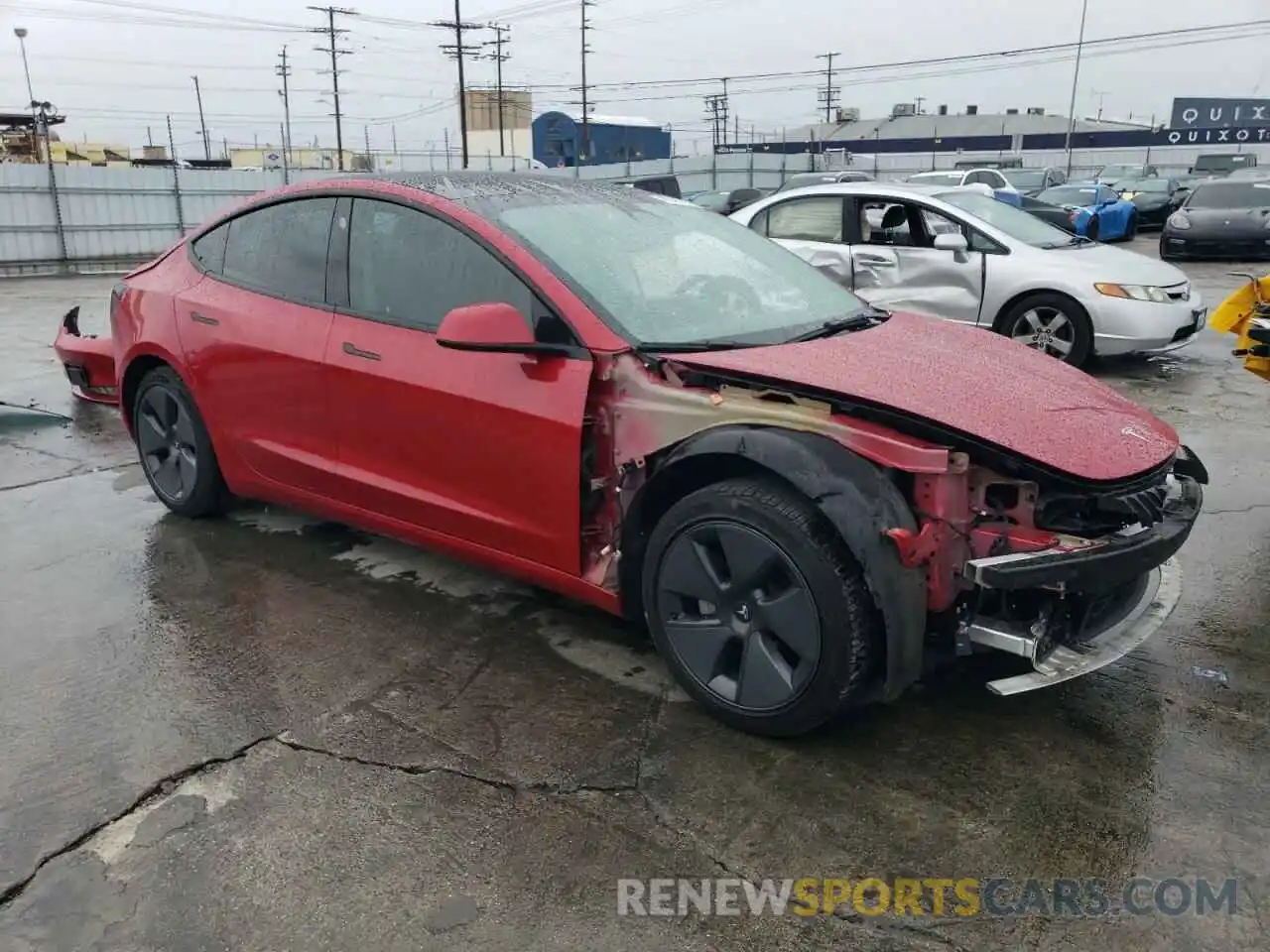 4 Photograph of a damaged car 5YJ3E1EB1NF273763 TESLA MODEL 3 2022