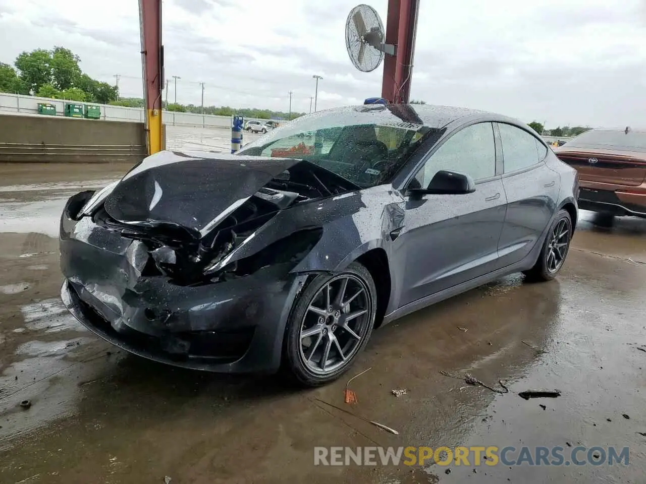 1 Photograph of a damaged car 5YJ3E1EB1NF285718 TESLA MODEL 3 2022