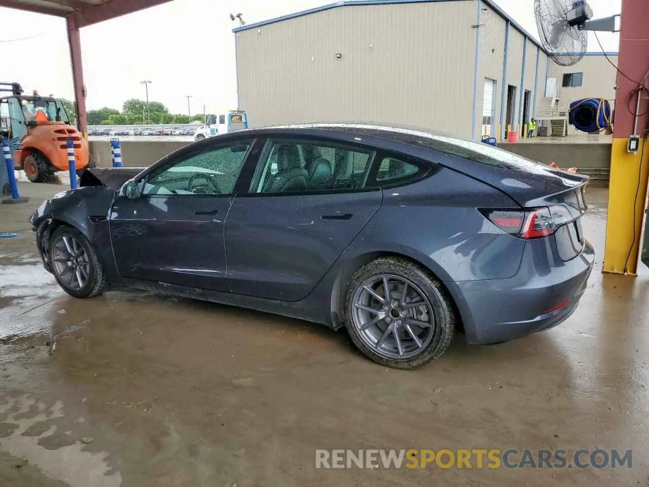 2 Photograph of a damaged car 5YJ3E1EB1NF285718 TESLA MODEL 3 2022