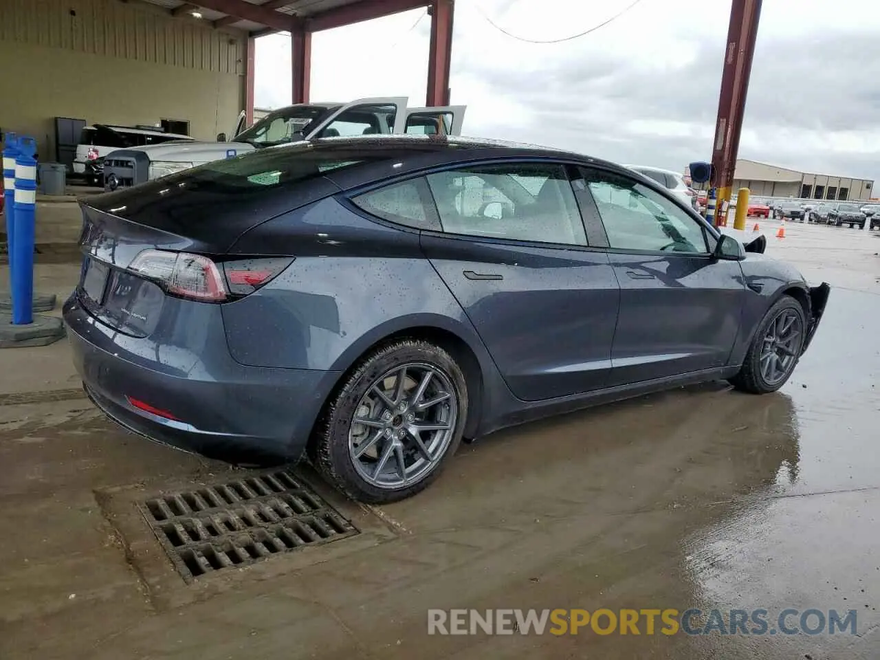 3 Photograph of a damaged car 5YJ3E1EB1NF285718 TESLA MODEL 3 2022