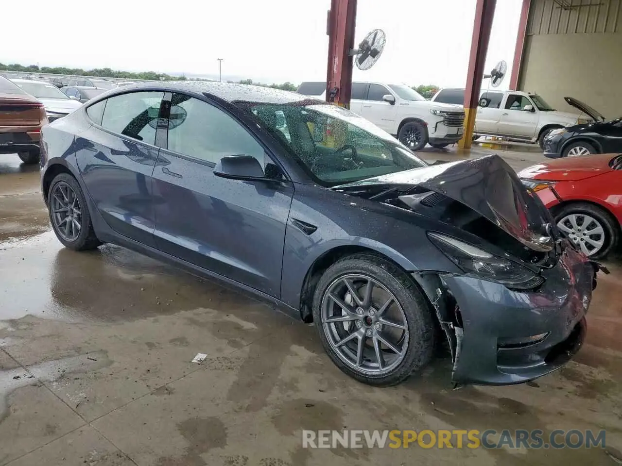 4 Photograph of a damaged car 5YJ3E1EB1NF285718 TESLA MODEL 3 2022