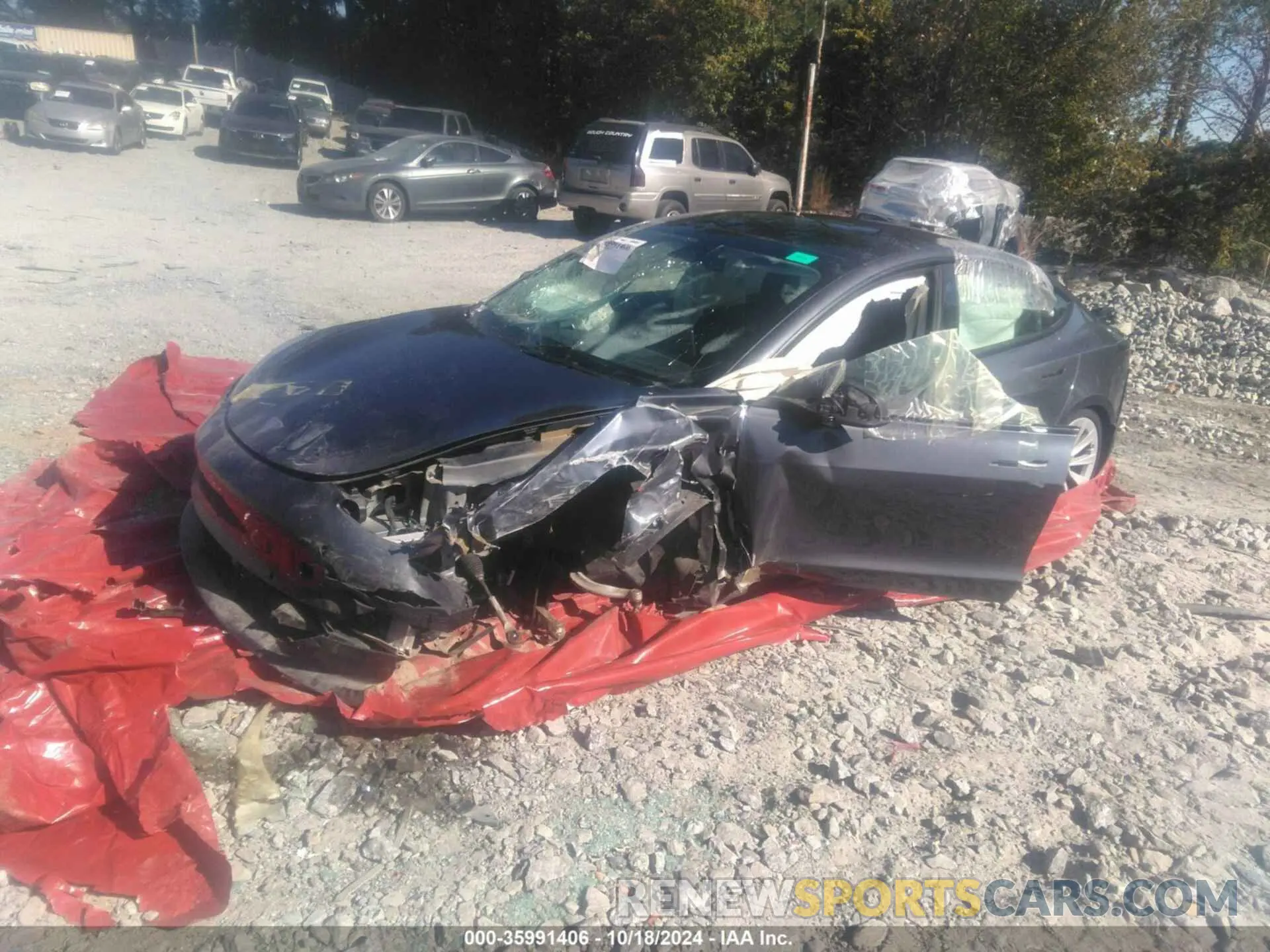 2 Photograph of a damaged car 5YJ3E1EB1NF304915 TESLA MODEL 3 2022