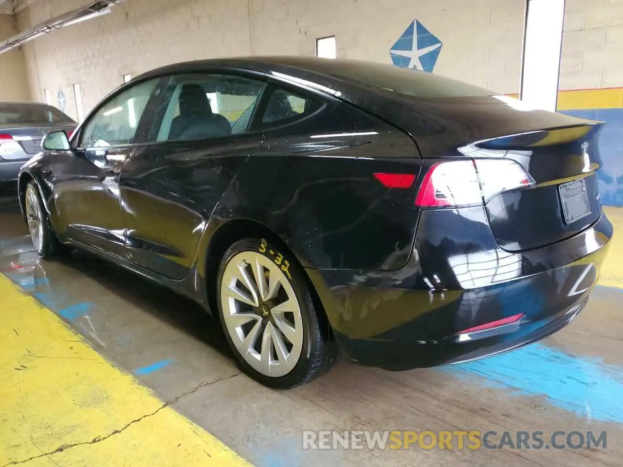 2 Photograph of a damaged car 5YJ3E1EB1NF304977 TESLA MODEL 3 2022
