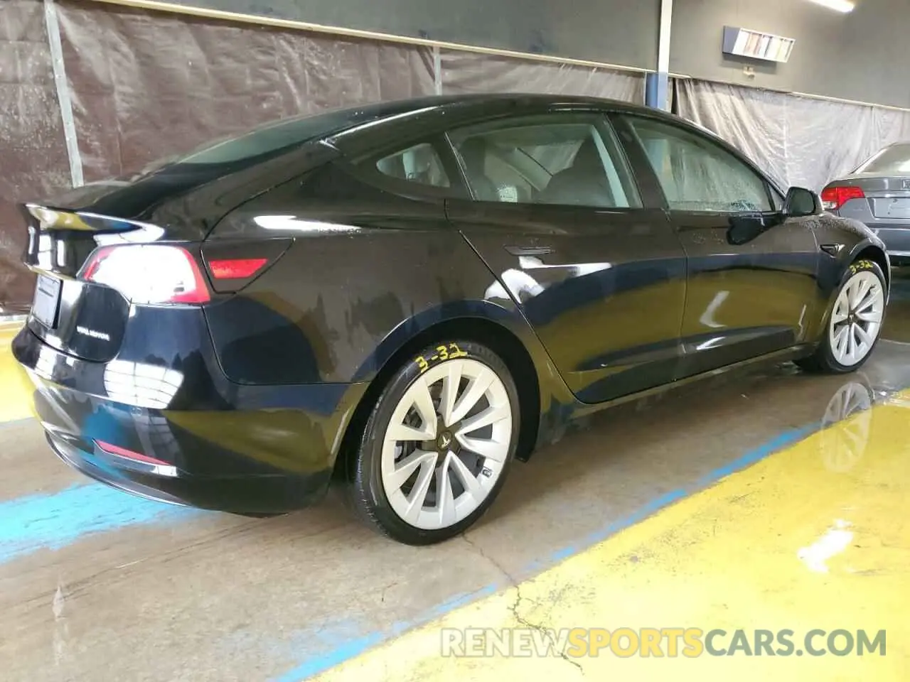 3 Photograph of a damaged car 5YJ3E1EB1NF304977 TESLA MODEL 3 2022