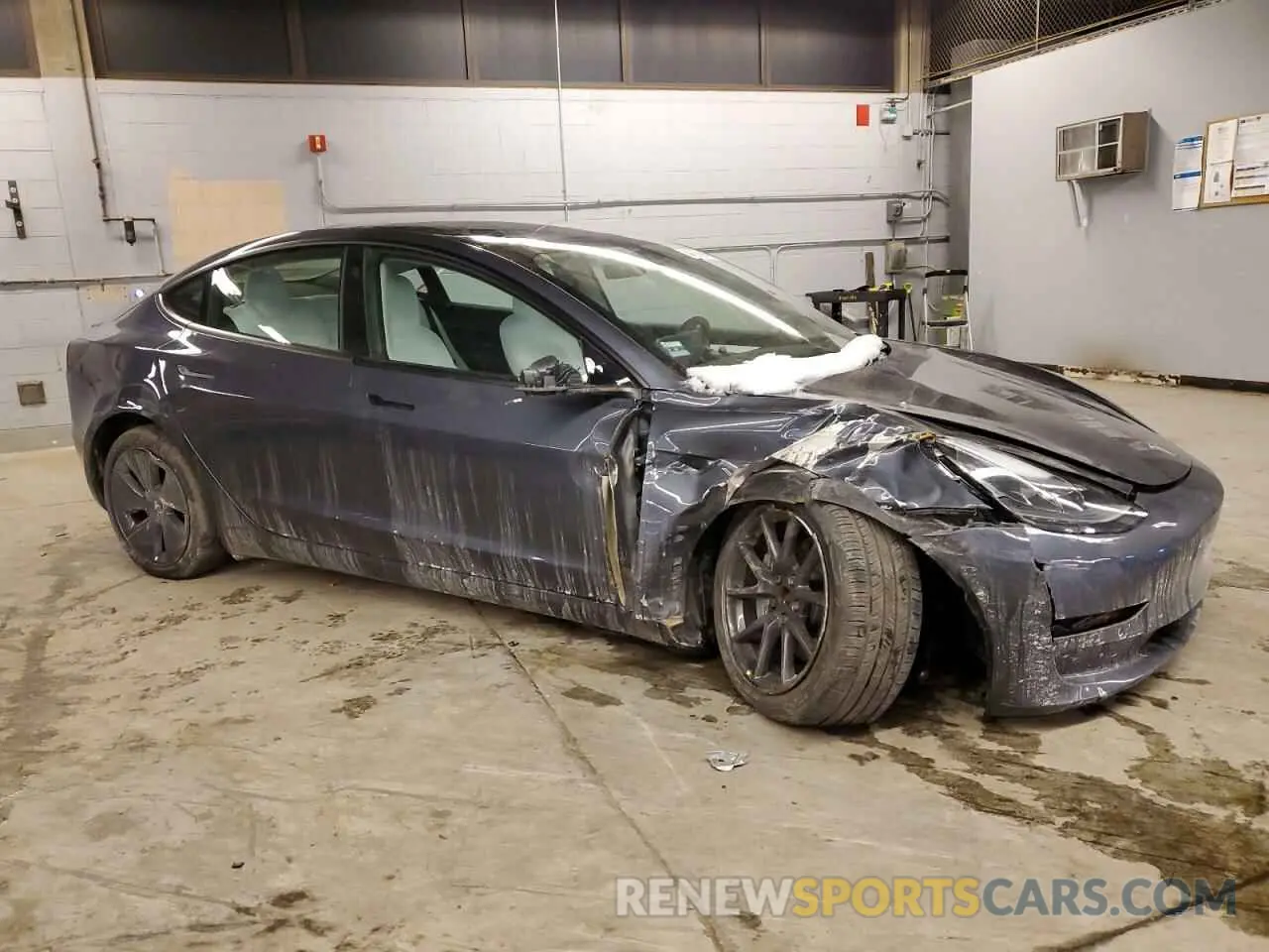 4 Photograph of a damaged car 5YJ3E1EB1NF317762 TESLA MODEL 3 2022