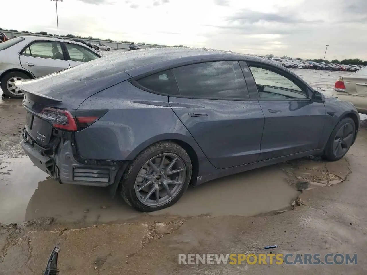 3 Photograph of a damaged car 5YJ3E1EB1NF321522 TESLA MODEL 3 2022
