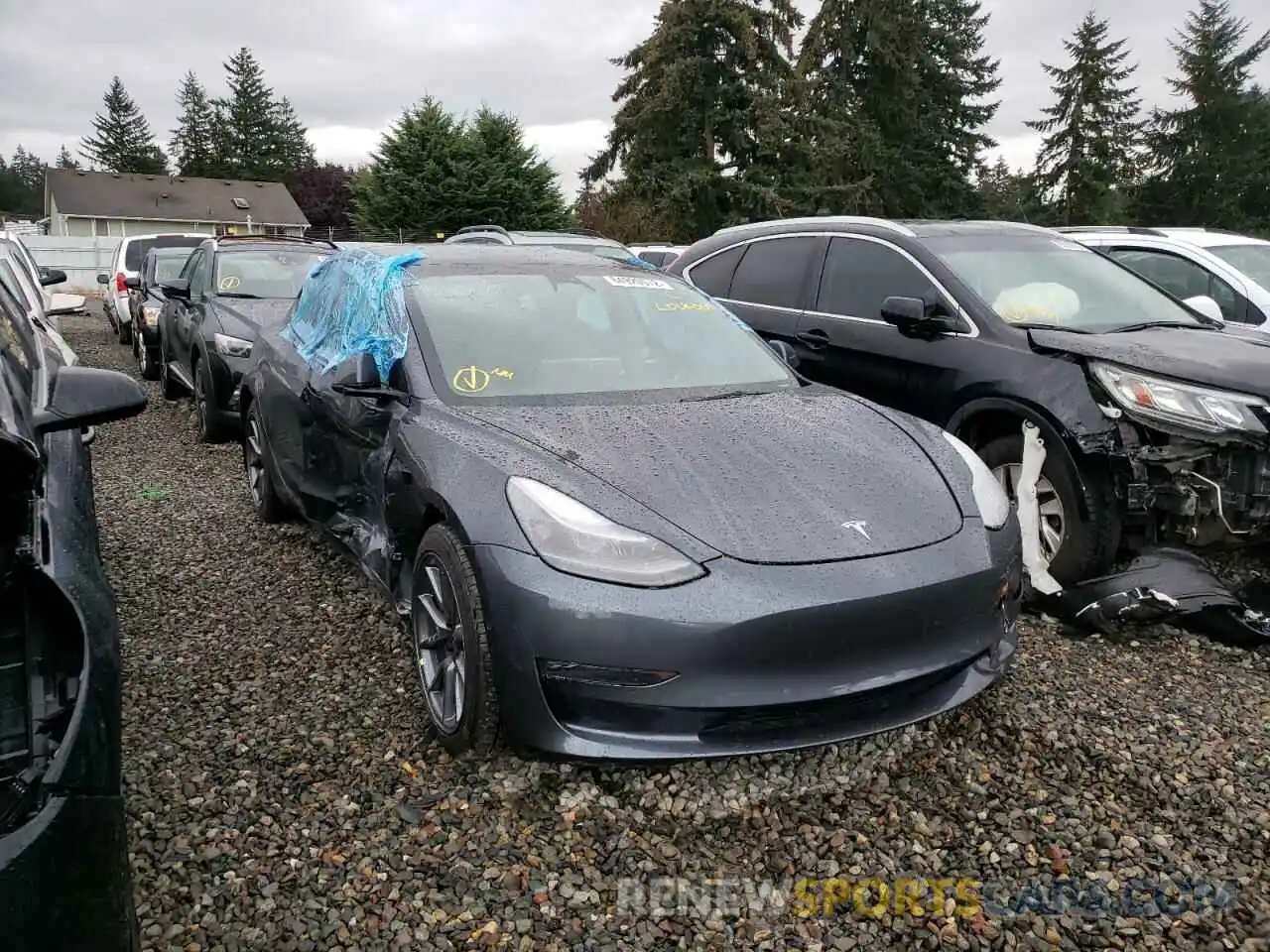 1 Photograph of a damaged car 5YJ3E1EB1NF334870 TESLA MODEL 3 2022