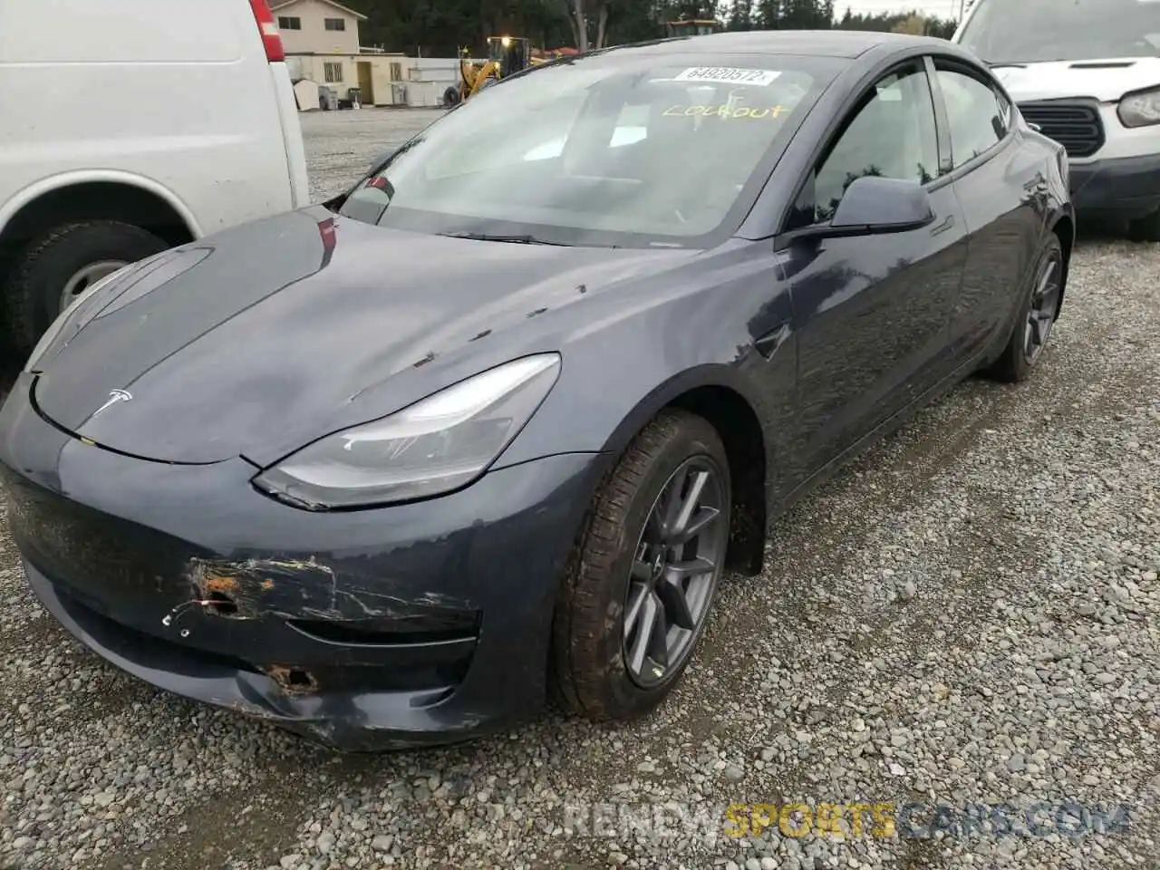 2 Photograph of a damaged car 5YJ3E1EB1NF334870 TESLA MODEL 3 2022