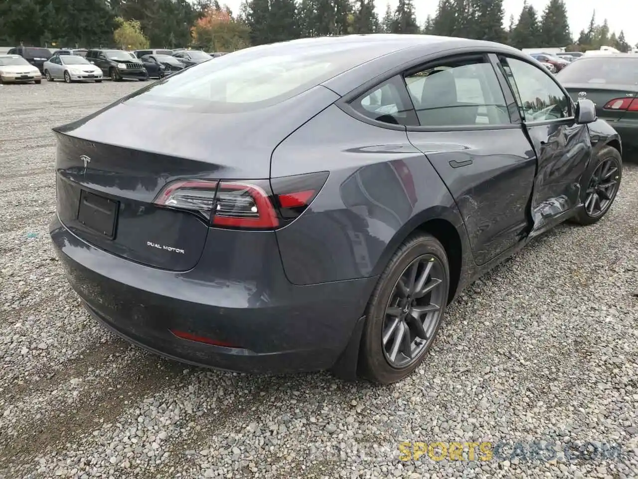 4 Photograph of a damaged car 5YJ3E1EB1NF334870 TESLA MODEL 3 2022