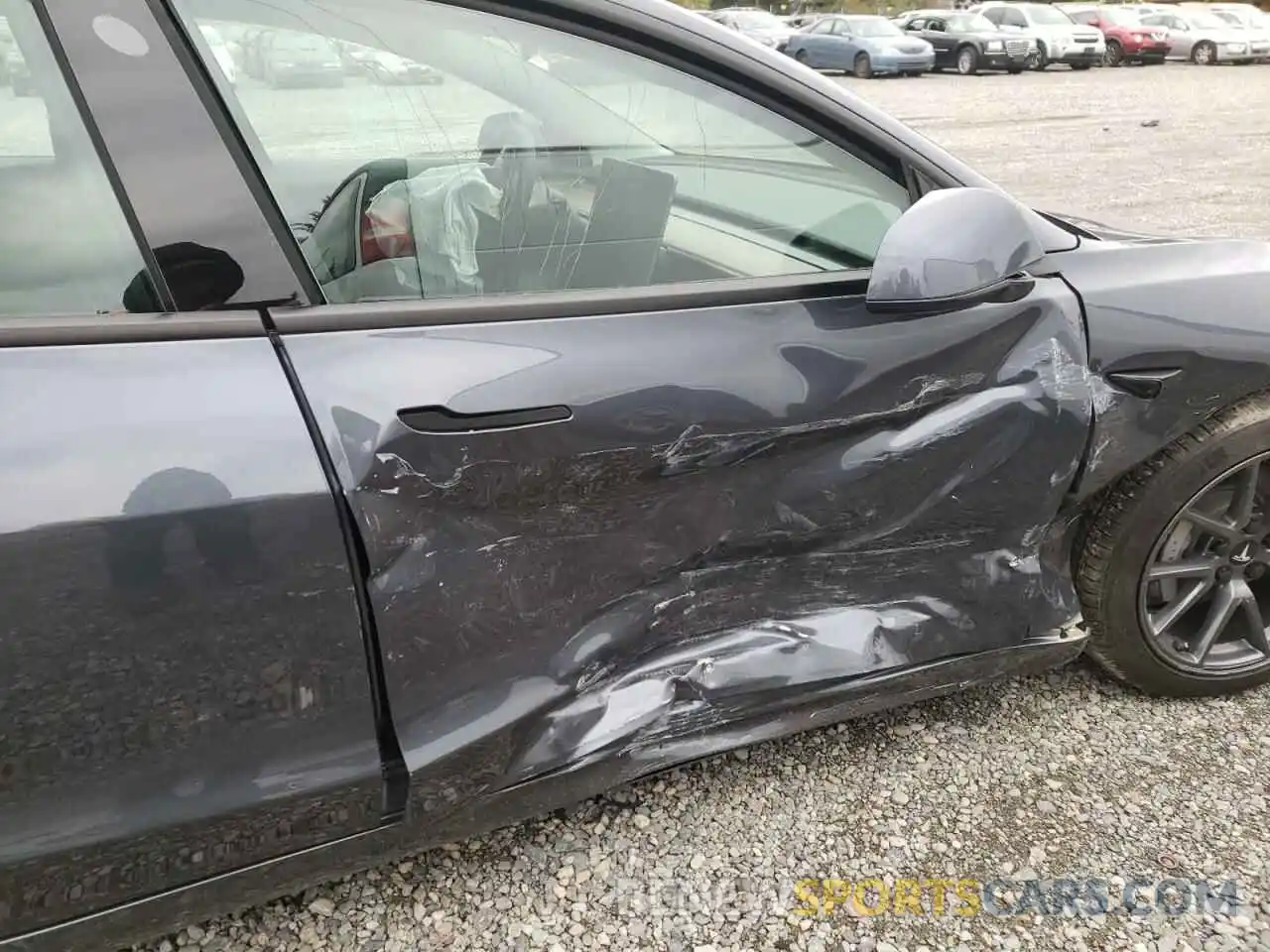 9 Photograph of a damaged car 5YJ3E1EB1NF334870 TESLA MODEL 3 2022