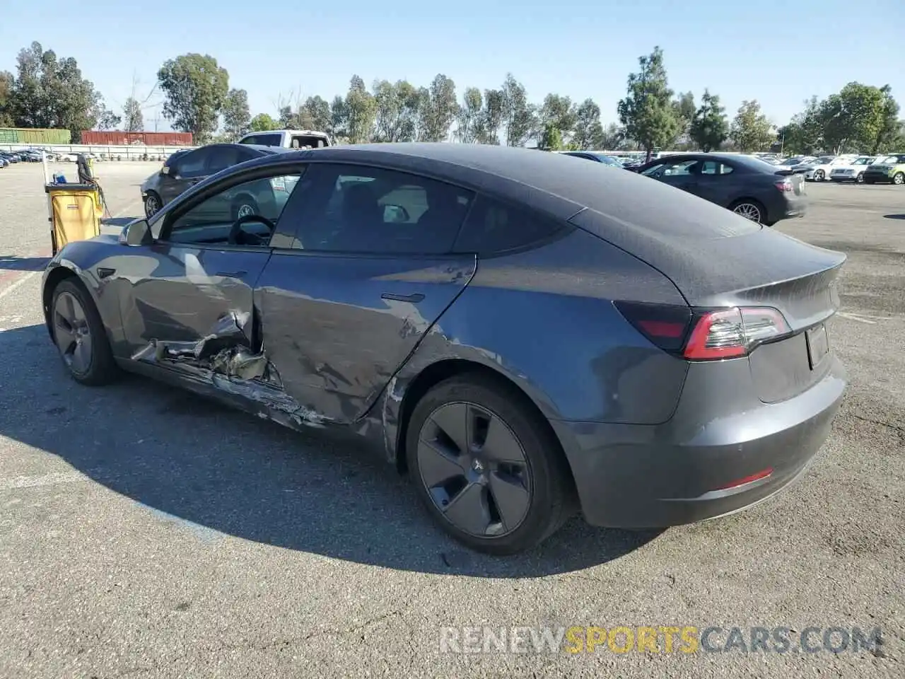 2 Photograph of a damaged car 5YJ3E1EB1NF357596 TESLA MODEL 3 2022