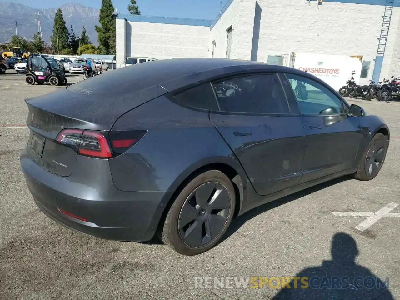 3 Photograph of a damaged car 5YJ3E1EB1NF357596 TESLA MODEL 3 2022