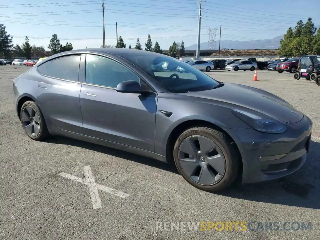 4 Photograph of a damaged car 5YJ3E1EB1NF357596 TESLA MODEL 3 2022