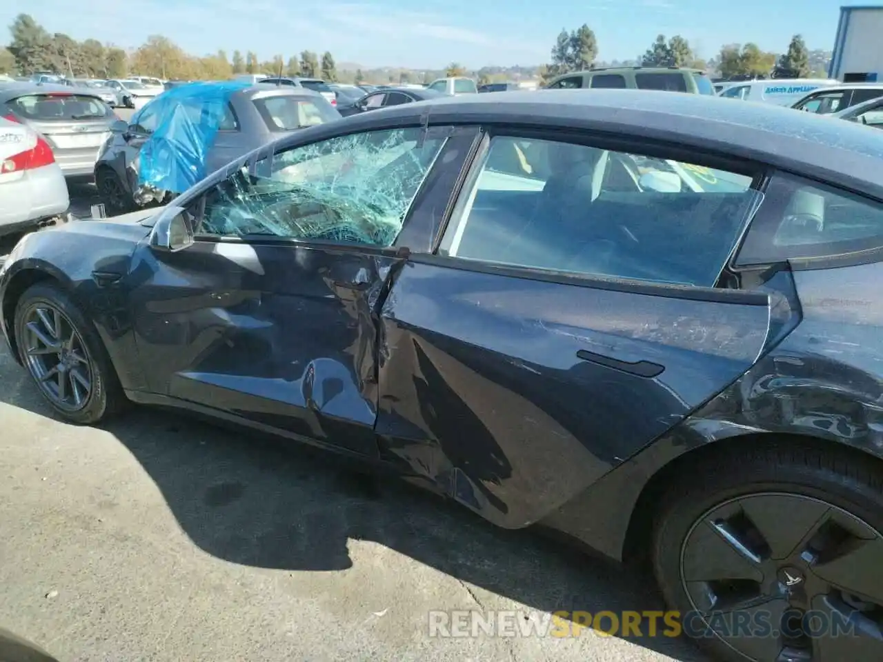 9 Photograph of a damaged car 5YJ3E1EB1NF363513 TESLA MODEL 3 2022