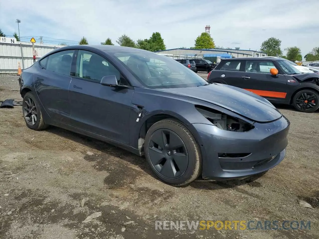 4 Photograph of a damaged car 5YJ3E1EB2NF111804 TESLA MODEL 3 2022