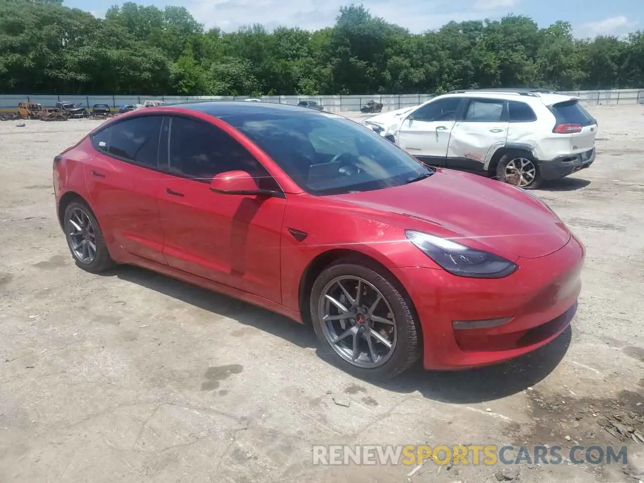 4 Photograph of a damaged car 5YJ3E1EB2NF112449 TESLA MODEL 3 2022