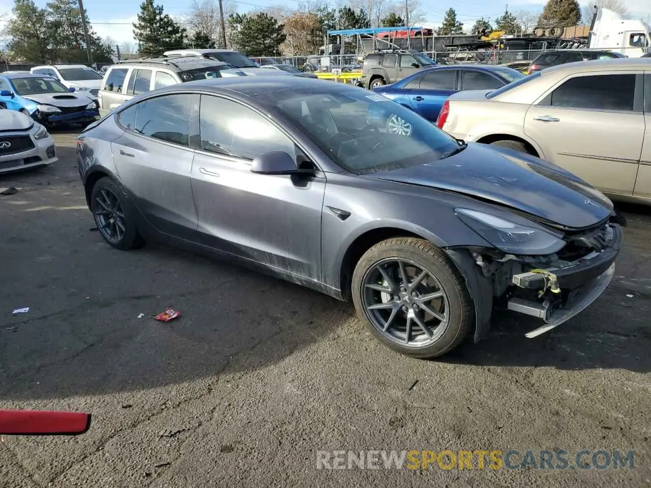 4 Photograph of a damaged car 5YJ3E1EB2NF127517 TESLA MODEL 3 2022