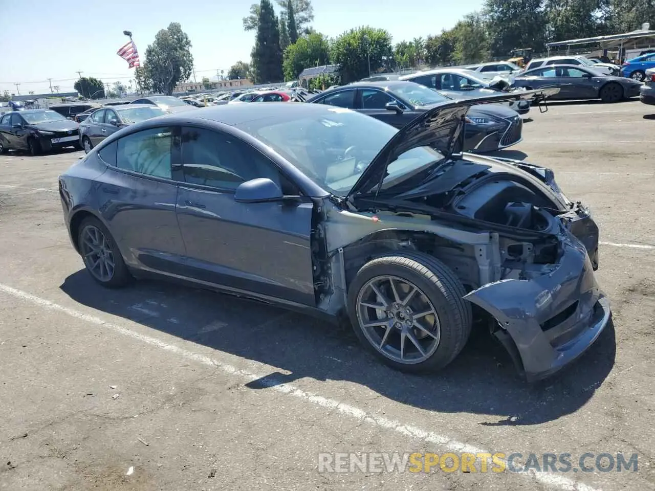 4 Photograph of a damaged car 5YJ3E1EB2NF132703 TESLA MODEL 3 2022