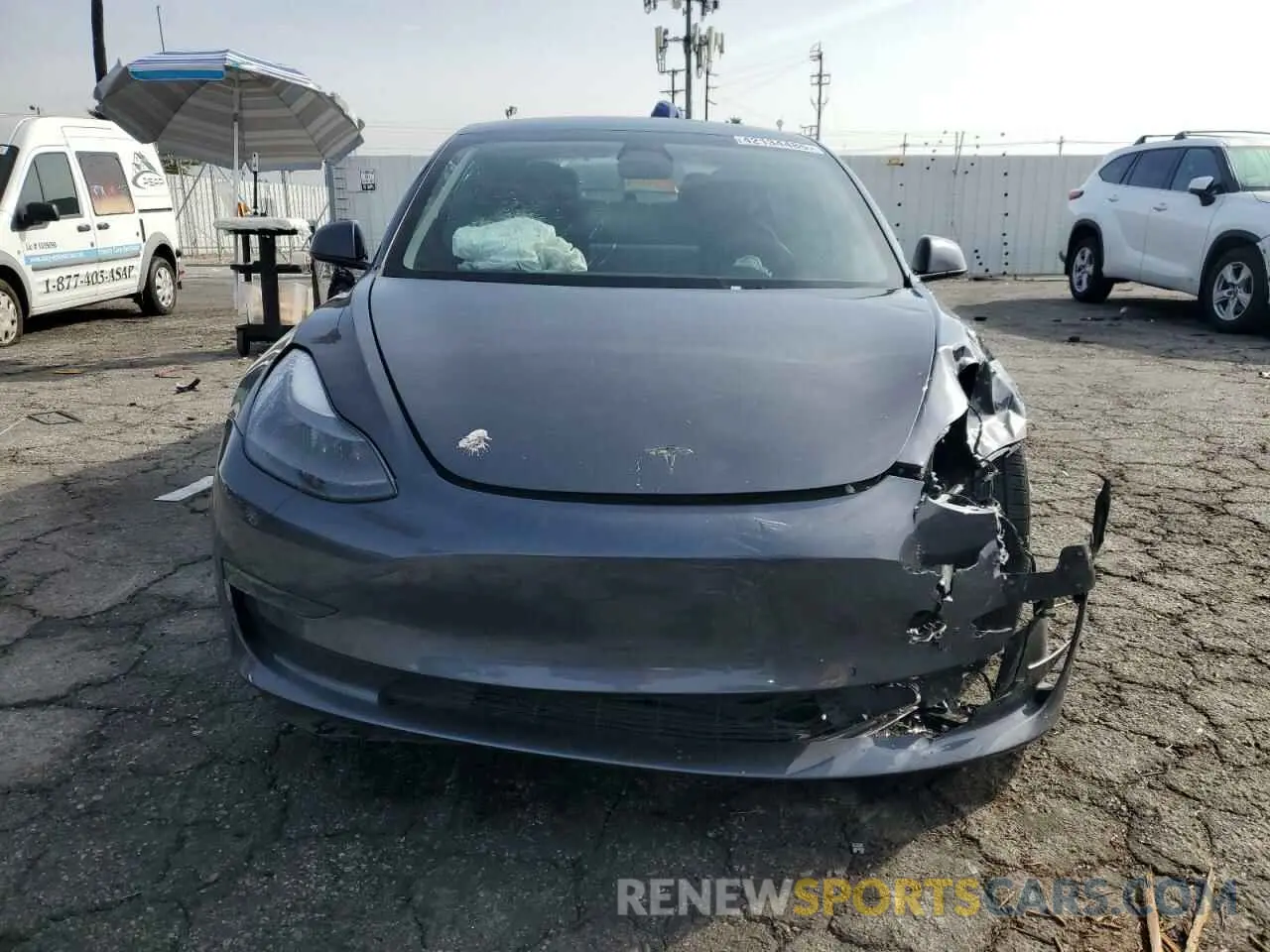 5 Photograph of a damaged car 5YJ3E1EB2NF137027 TESLA MODEL 3 2022