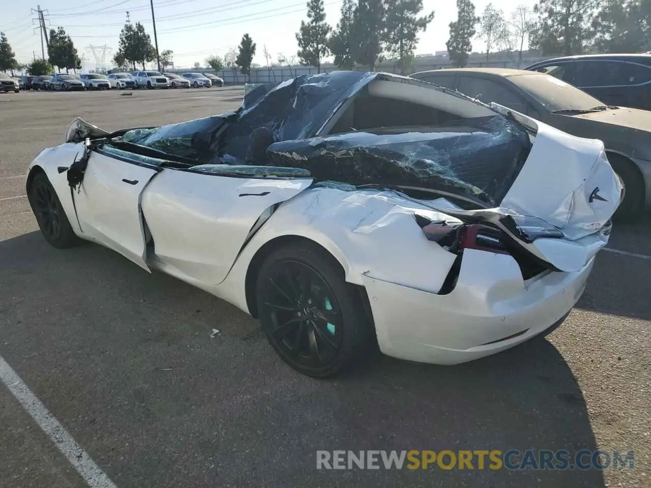 2 Photograph of a damaged car 5YJ3E1EB2NF145385 TESLA MODEL 3 2022