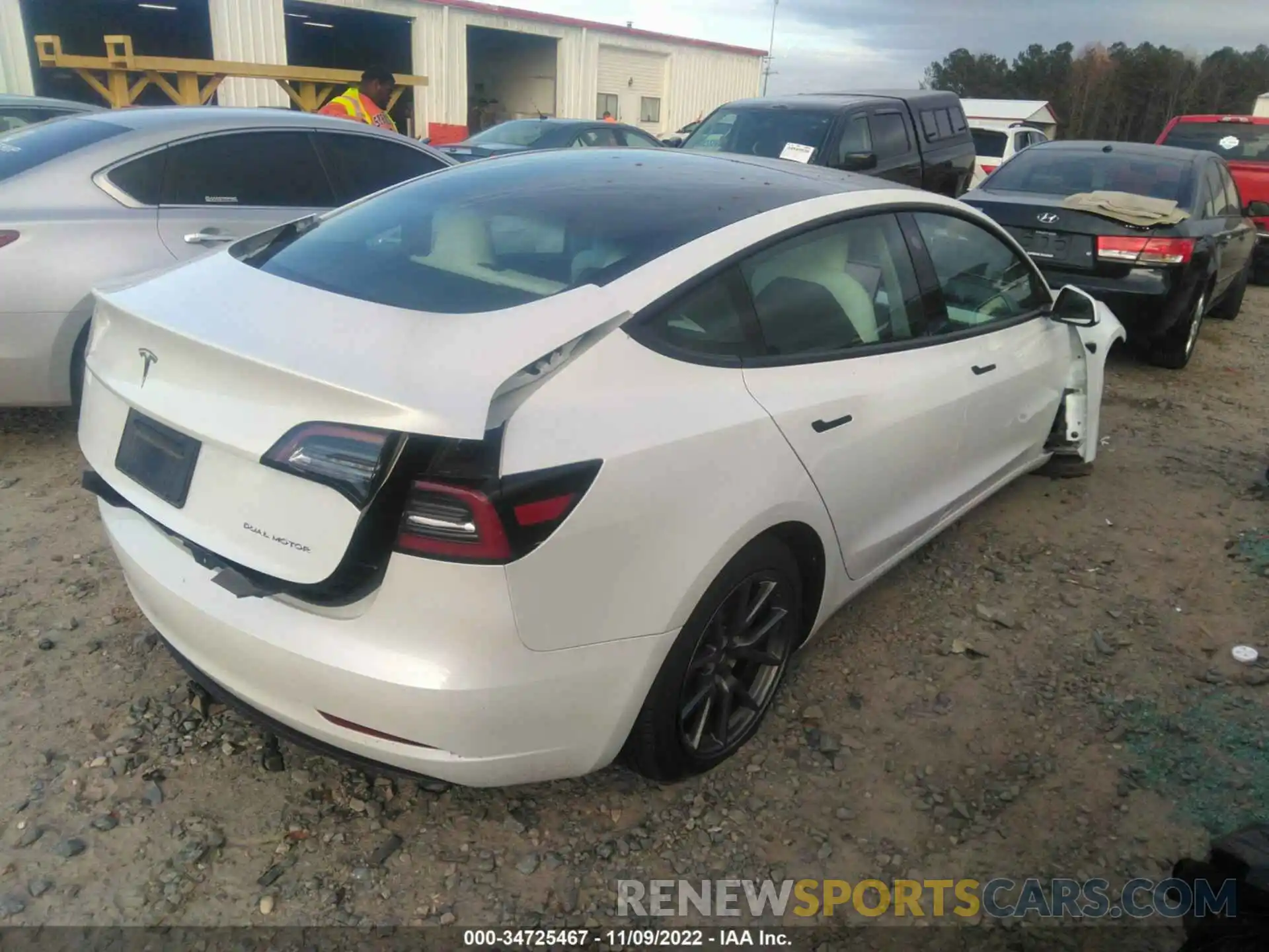 4 Photograph of a damaged car 5YJ3E1EB2NF168522 TESLA MODEL 3 2022