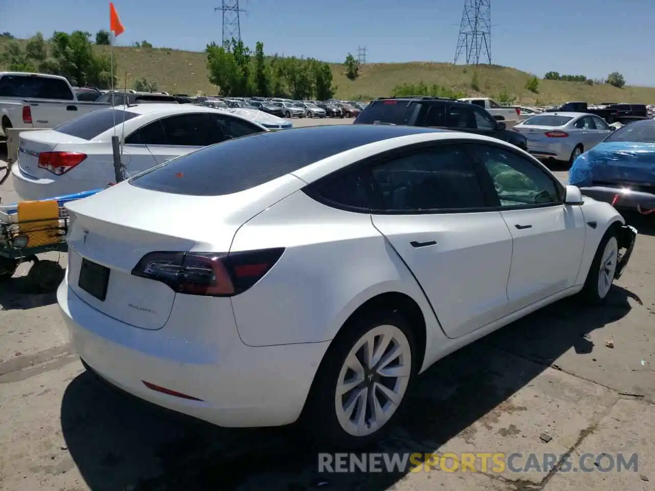 4 Photograph of a damaged car 5YJ3E1EB2NF180895 TESLA MODEL 3 2022