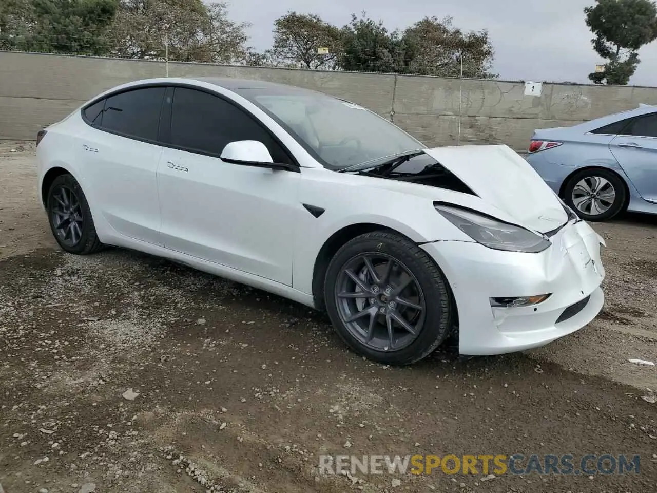 4 Photograph of a damaged car 5YJ3E1EB2NF180959 TESLA MODEL 3 2022