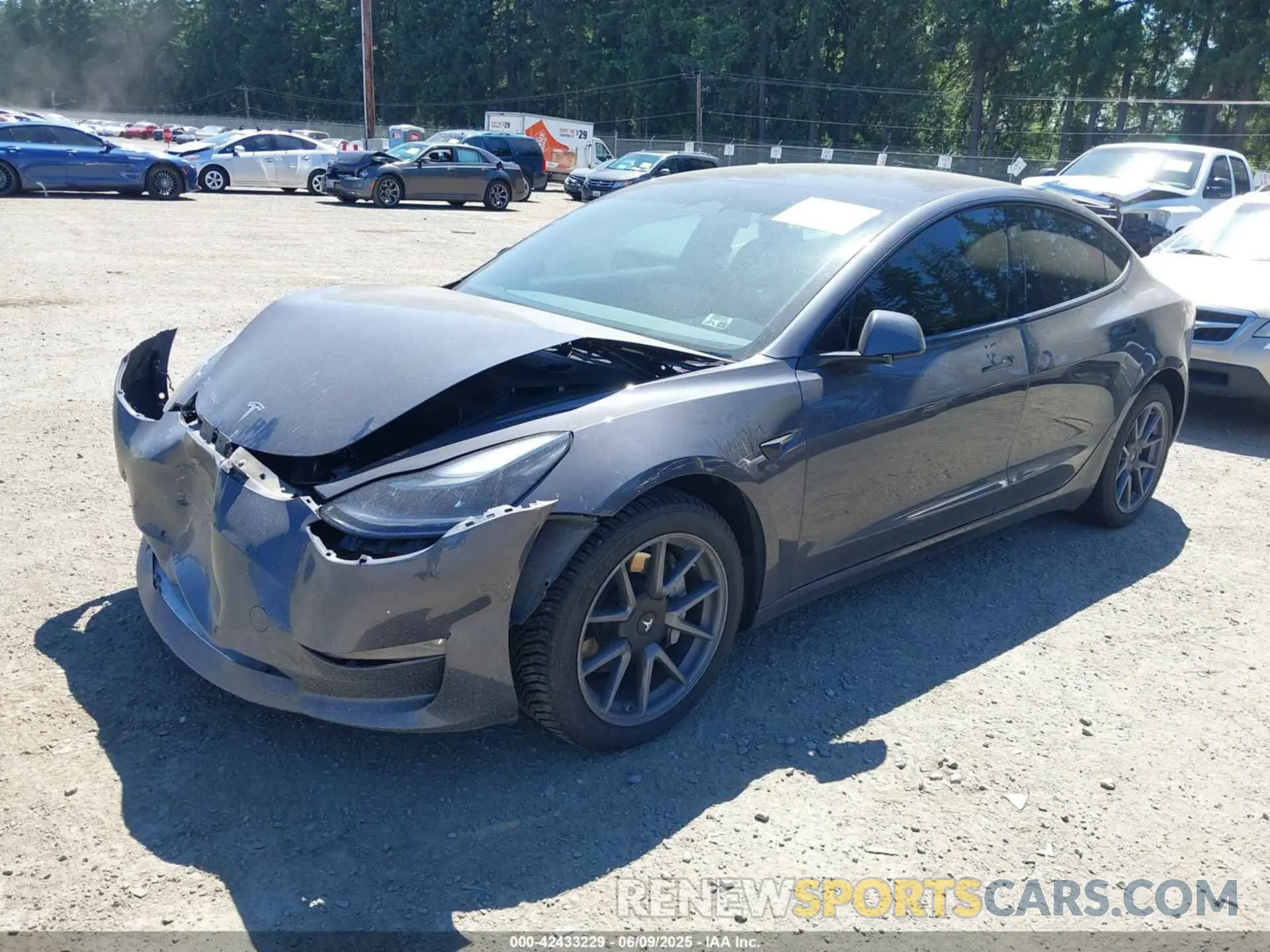 2 Photograph of a damaged car 5YJ3E1EB2NF182940 TESLA MODEL 3 2022