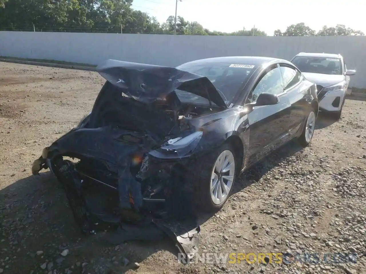 2 Photograph of a damaged car 5YJ3E1EB2NF192299 TESLA MODEL 3 2022