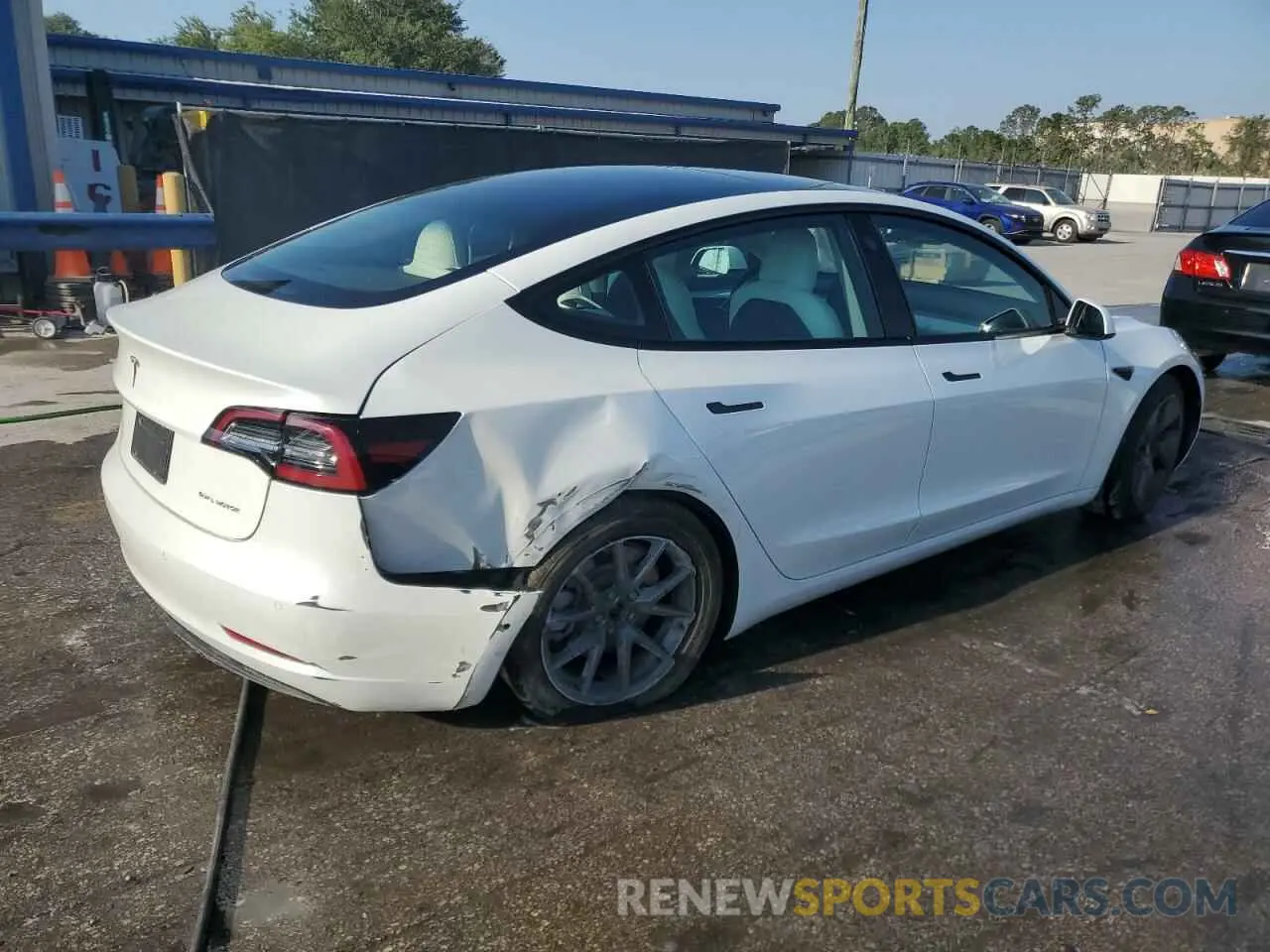 3 Photograph of a damaged car 5YJ3E1EB2NF199141 TESLA MODEL 3 2022