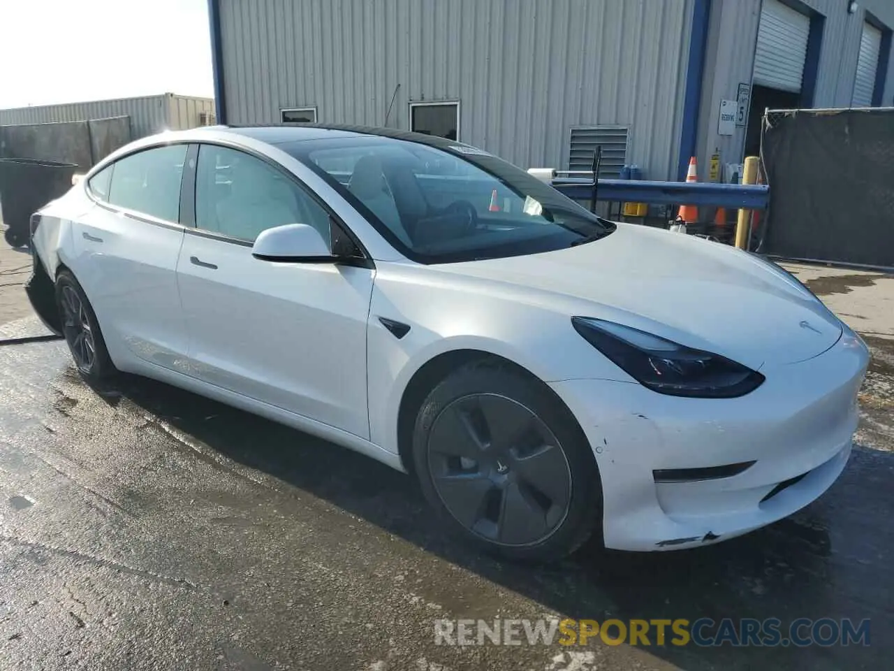 4 Photograph of a damaged car 5YJ3E1EB2NF199141 TESLA MODEL 3 2022