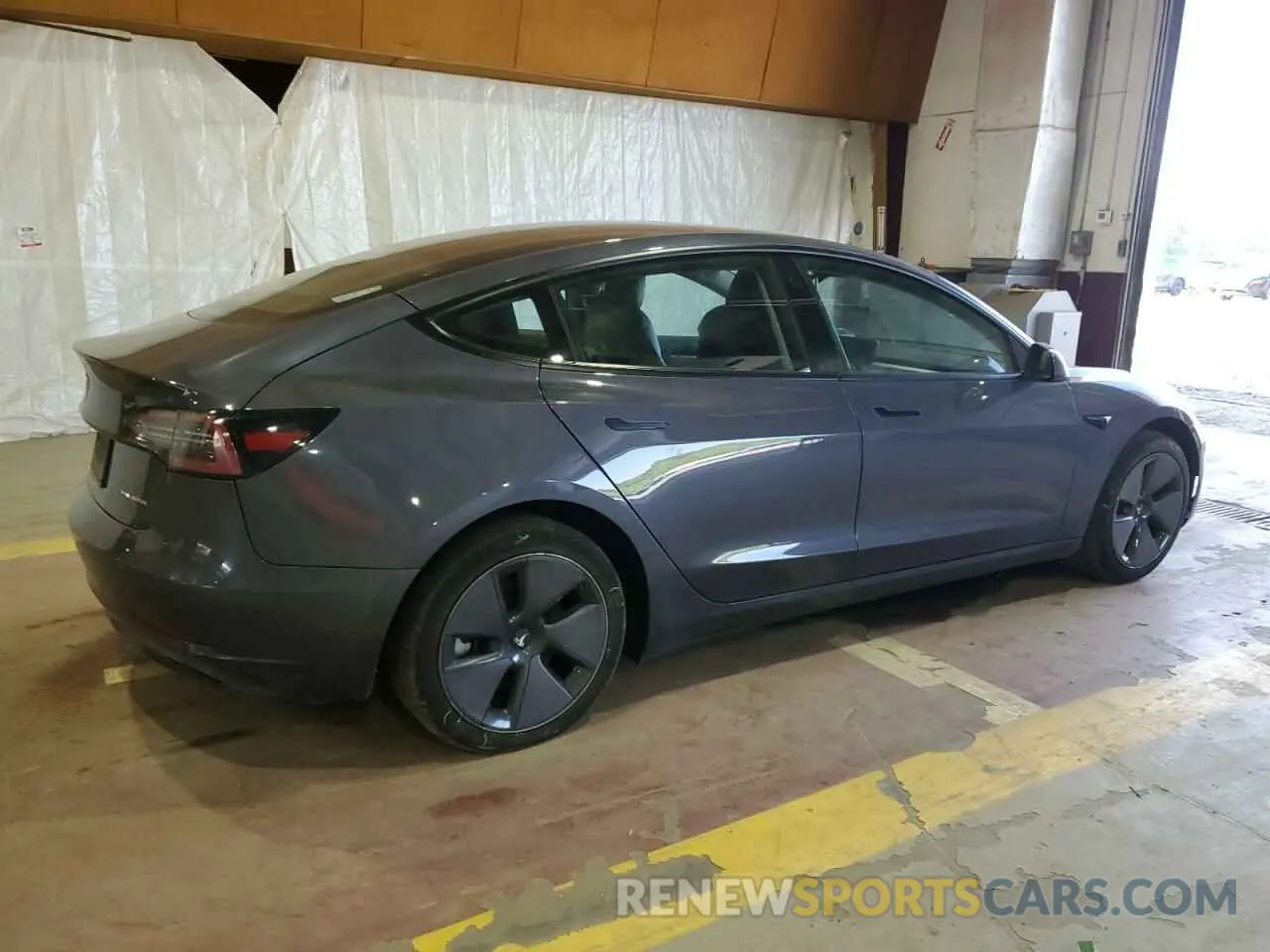 3 Photograph of a damaged car 5YJ3E1EB2NF204922 TESLA MODEL 3 2022