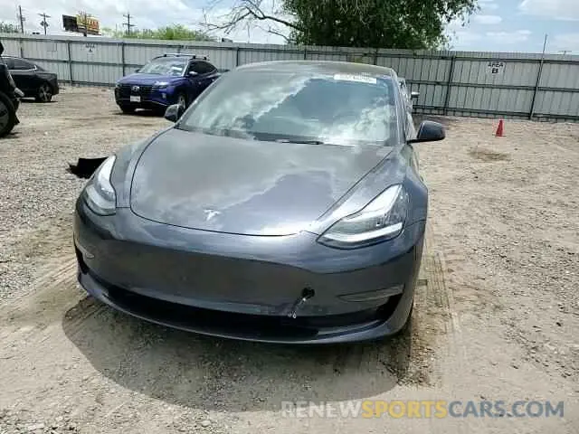 12 Photograph of a damaged car 5YJ3E1EB2NF263064 TESLA MODEL 3 2022