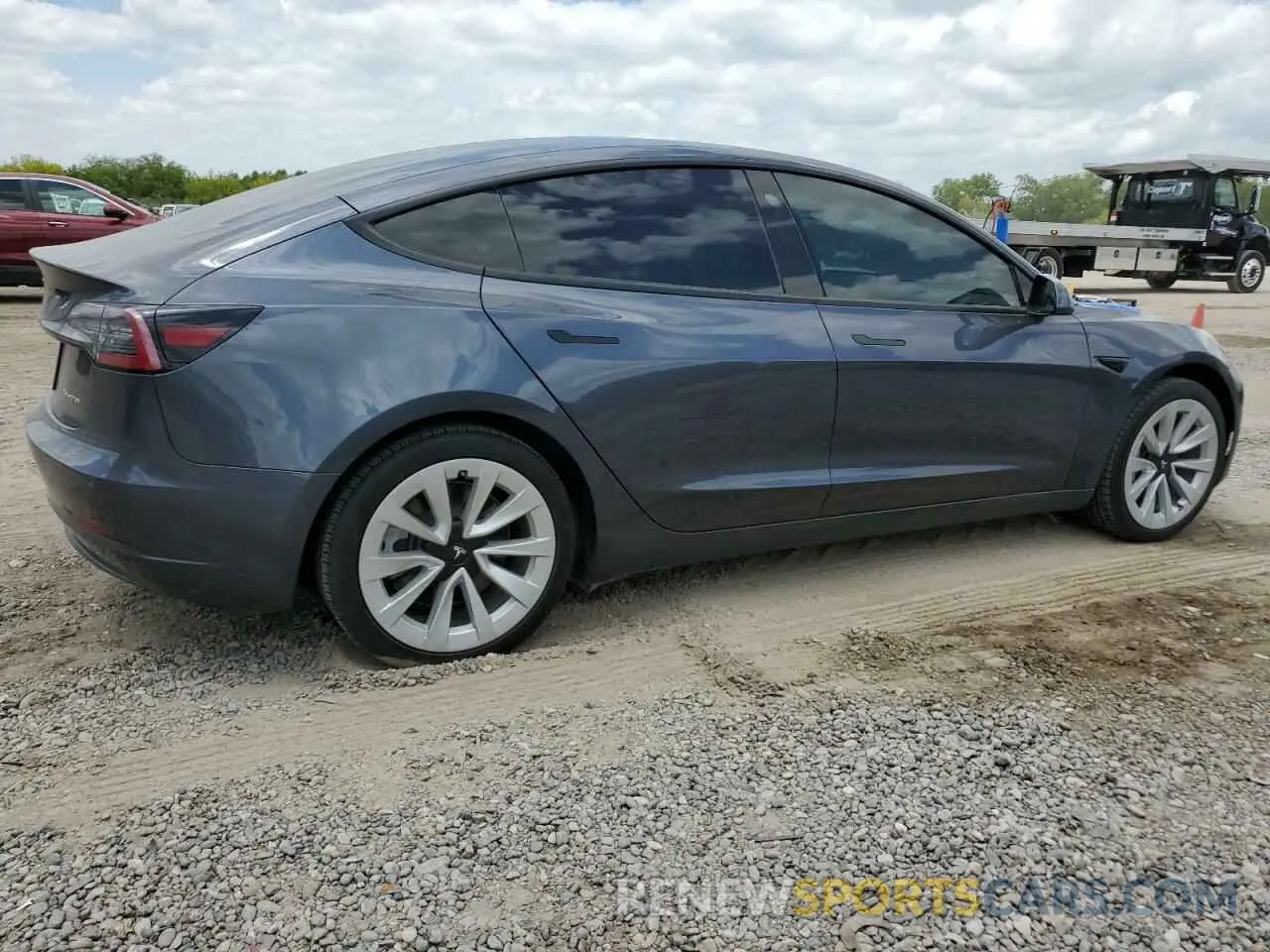 3 Photograph of a damaged car 5YJ3E1EB2NF263064 TESLA MODEL 3 2022