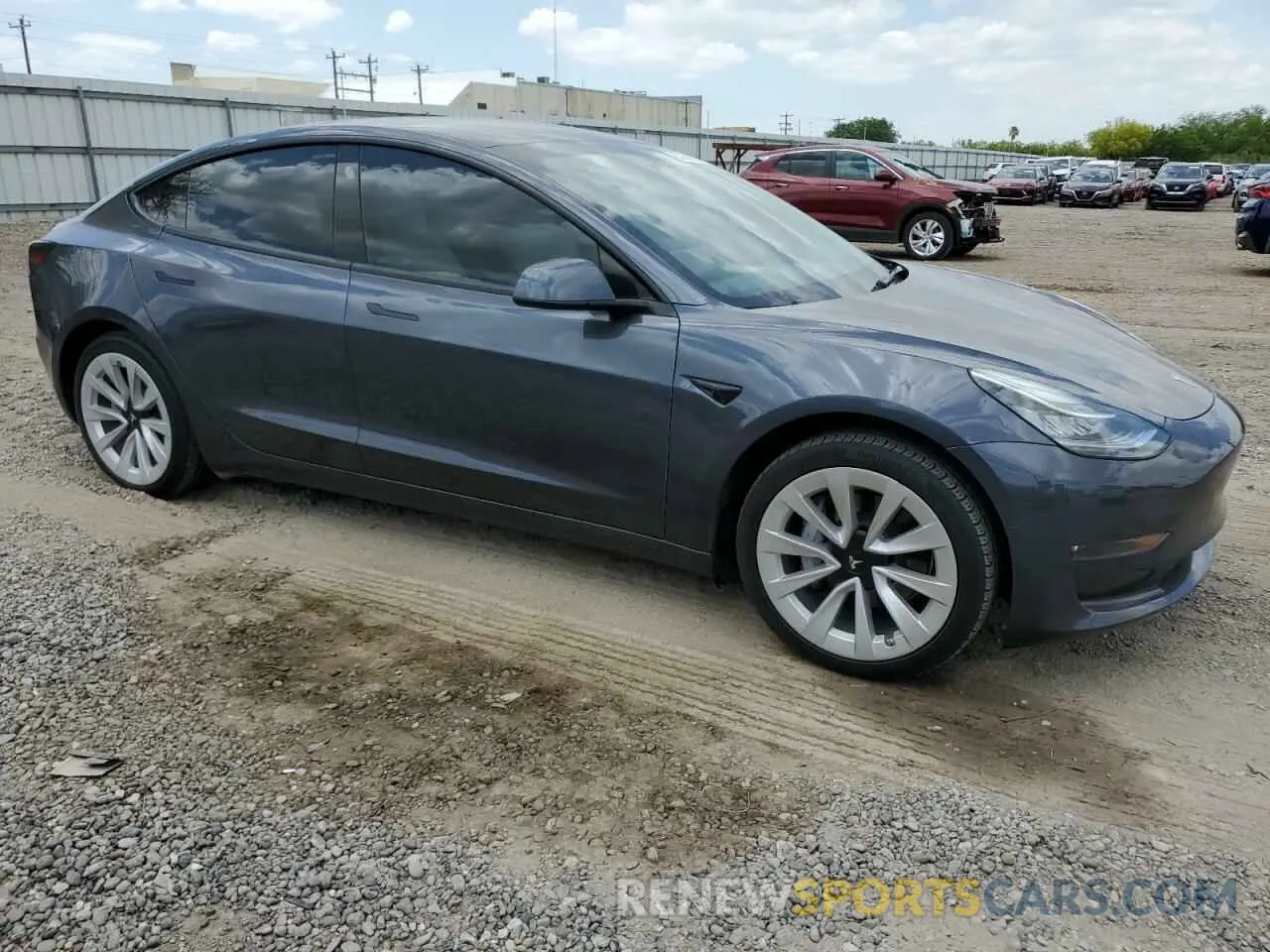 4 Photograph of a damaged car 5YJ3E1EB2NF263064 TESLA MODEL 3 2022