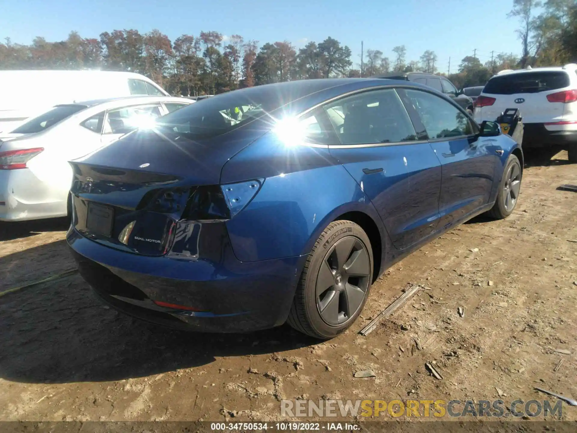 4 Photograph of a damaged car 5YJ3E1EB2NF288062 TESLA MODEL 3 2022