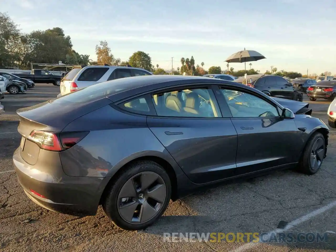 3 Photograph of a damaged car 5YJ3E1EB2NF313283 TESLA MODEL 3 2022