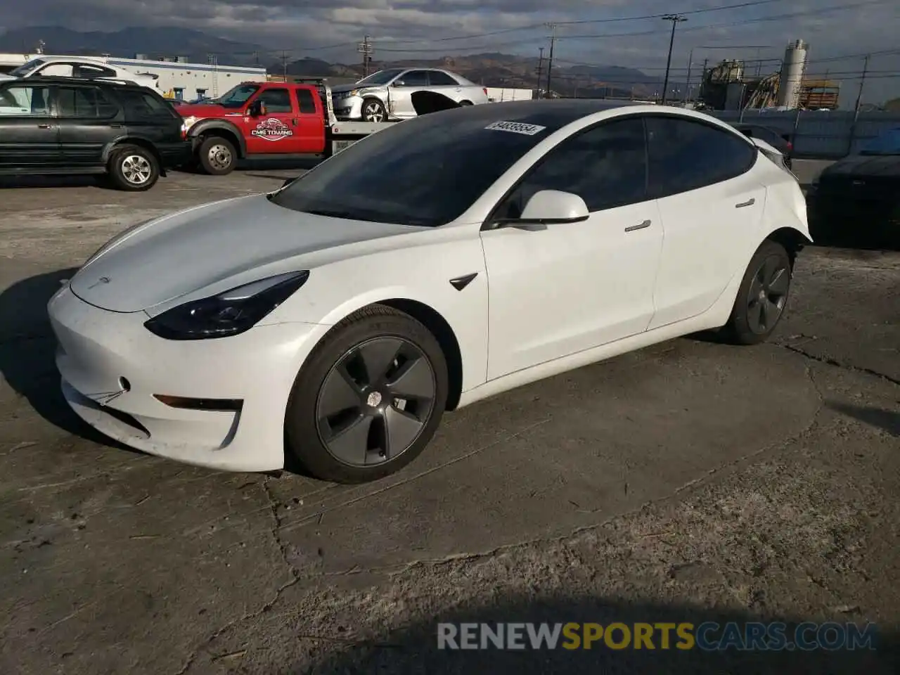 1 Photograph of a damaged car 5YJ3E1EB2NF323974 TESLA MODEL 3 2022