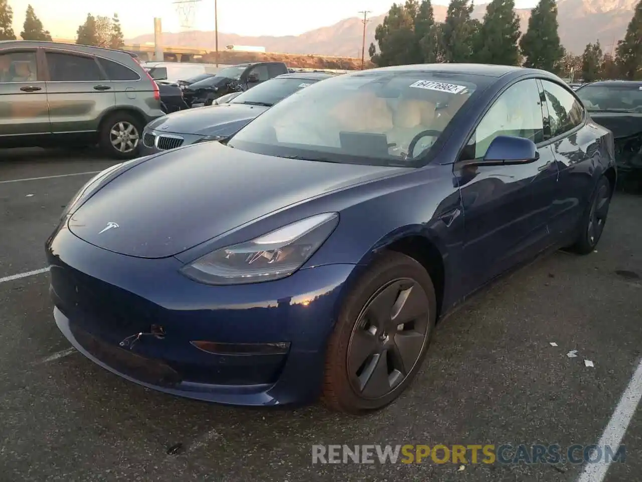 2 Photograph of a damaged car 5YJ3E1EB2NF325854 TESLA MODEL 3 2022