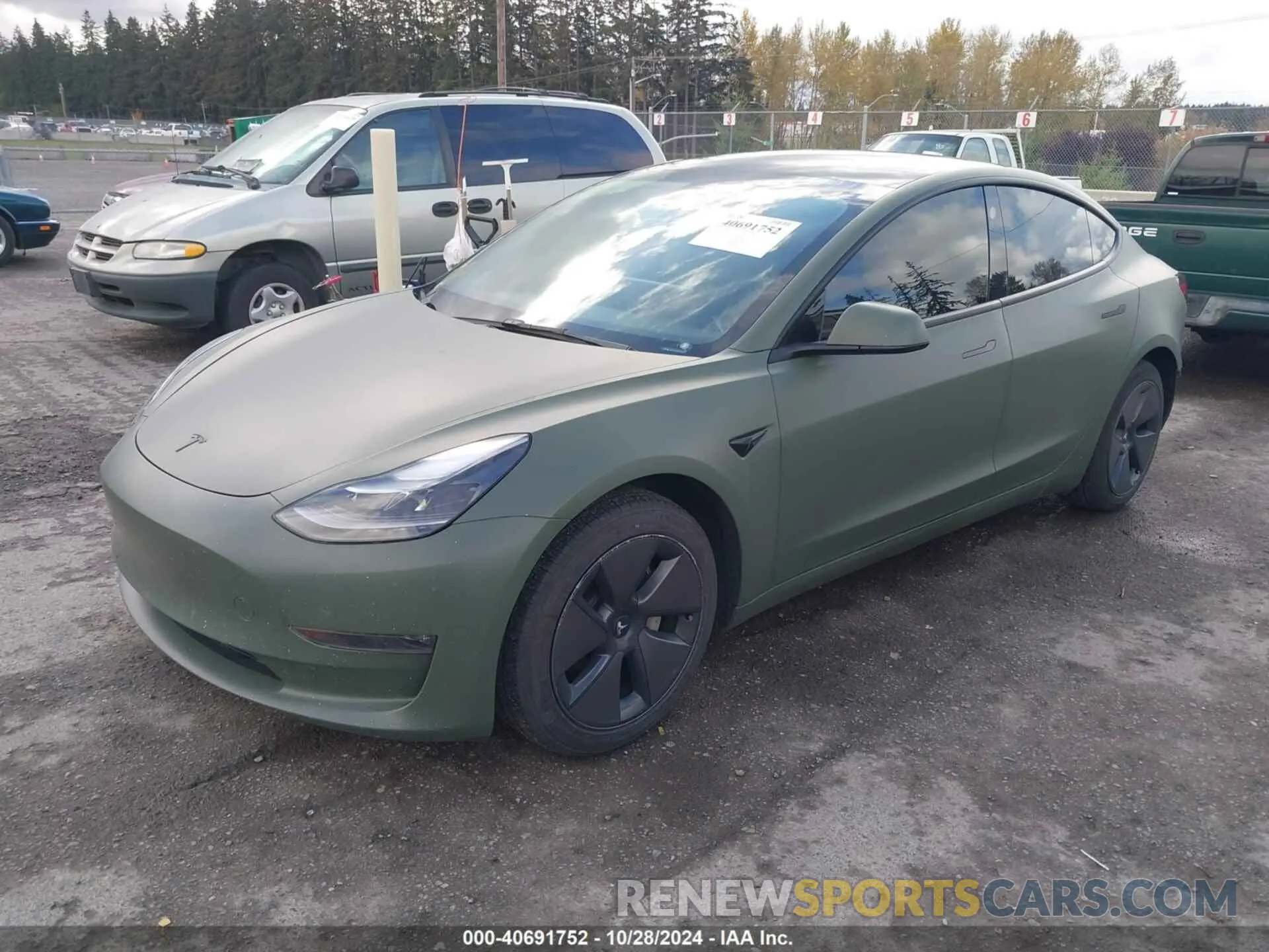 2 Photograph of a damaged car 5YJ3E1EB2NF326941 TESLA MODEL 3 2022
