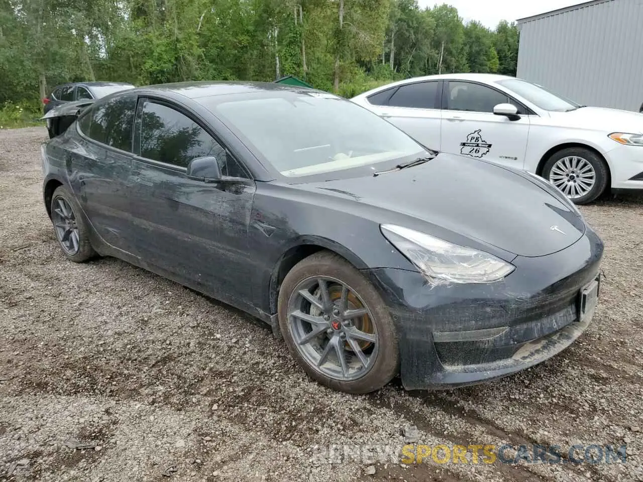 4 Photograph of a damaged car 5YJ3E1EB2NF335770 TESLA MODEL 3 2022