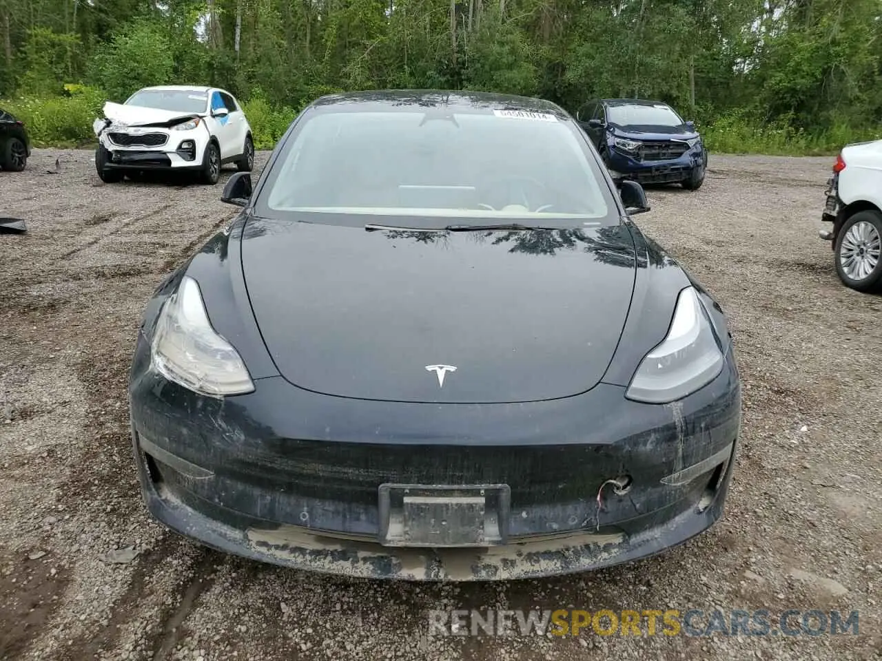 5 Photograph of a damaged car 5YJ3E1EB2NF335770 TESLA MODEL 3 2022