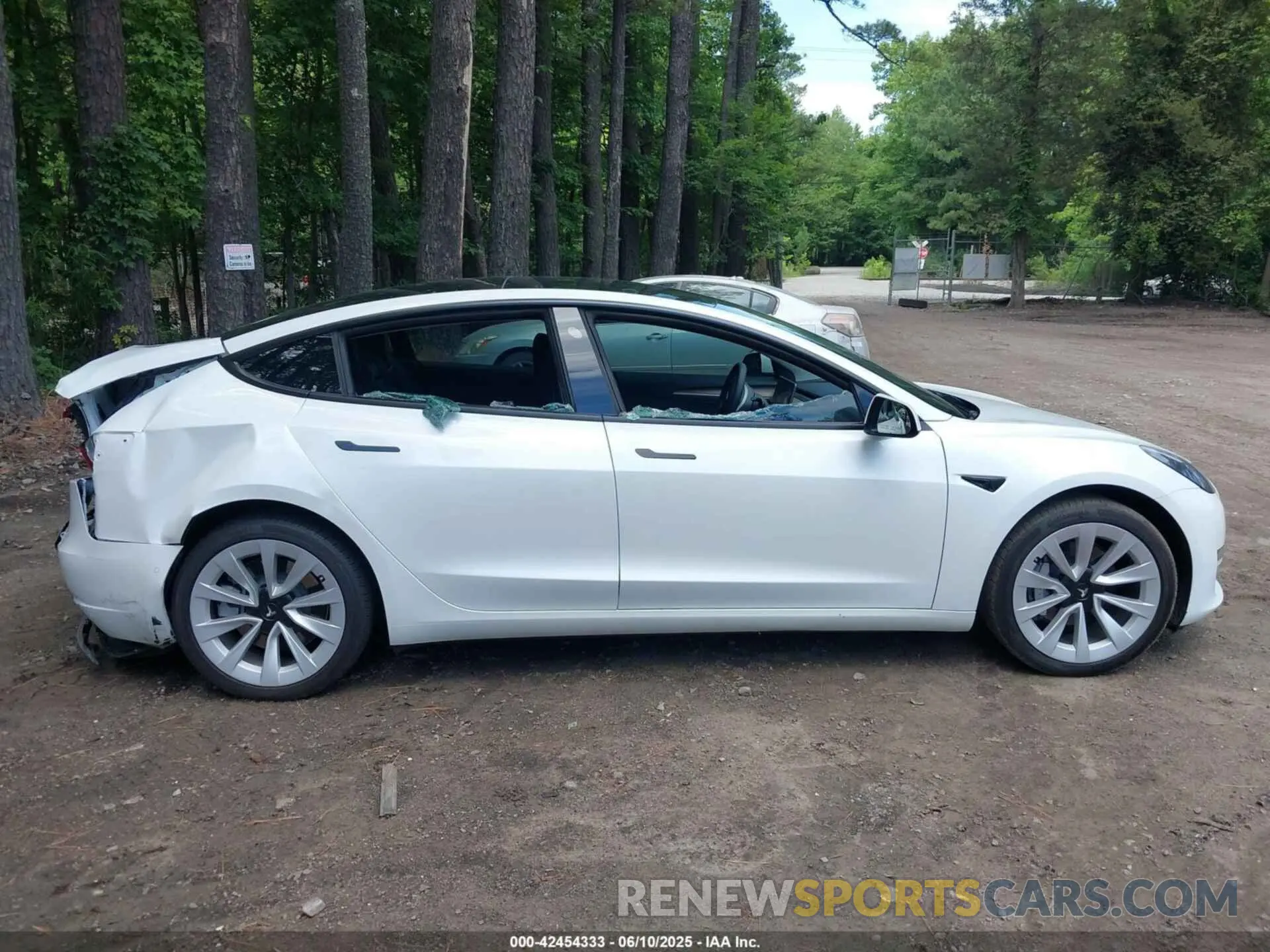 12 Photograph of a damaged car 5YJ3E1EB2NF359485 TESLA MODEL 3 2022