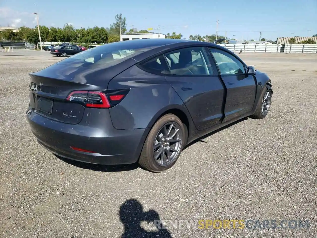 4 Photograph of a damaged car 5YJ3E1EB3NF103386 TESLA MODEL 3 2022