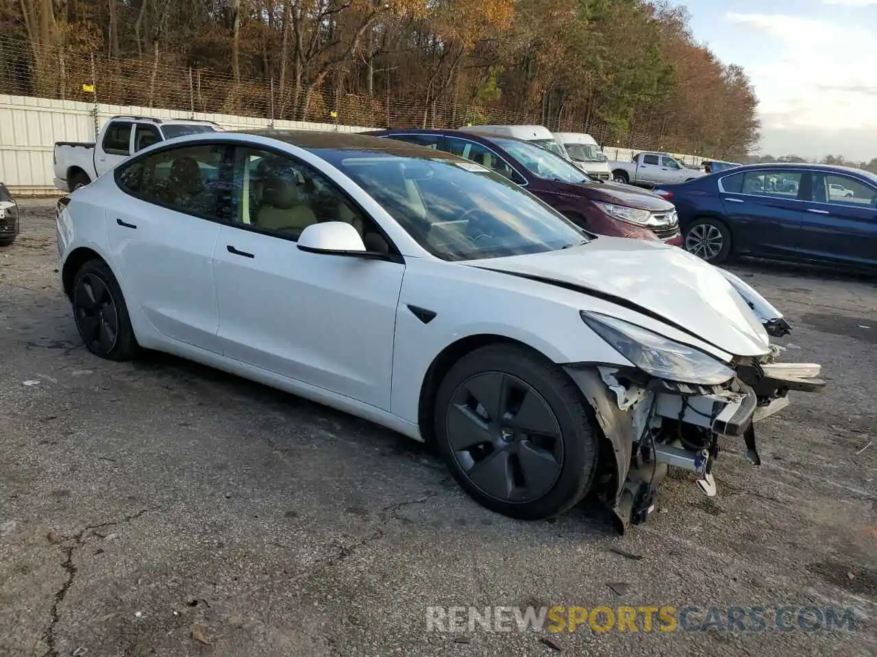 4 Photograph of a damaged car 5YJ3E1EB3NF103419 TESLA MODEL 3 2022