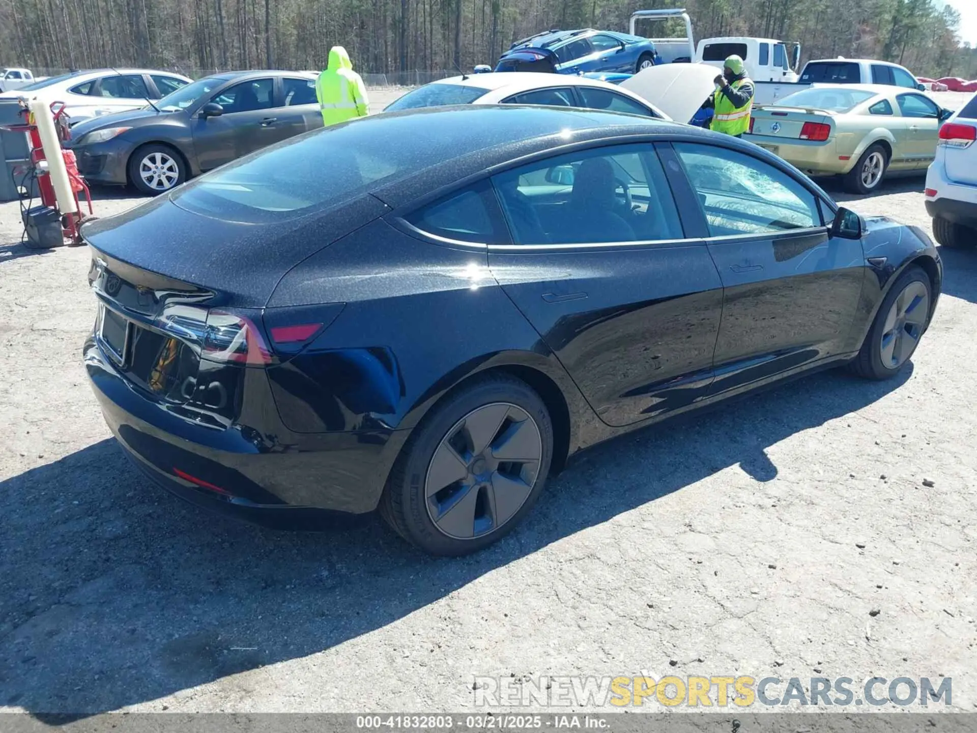 4 Photograph of a damaged car 5YJ3E1EB3NF104313 TESLA MODEL 3 2022