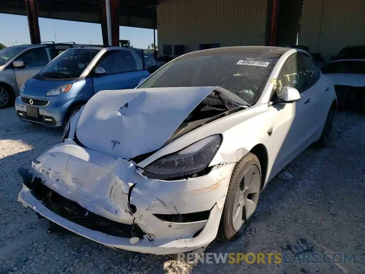 2 Photograph of a damaged car 5YJ3E1EB3NF105722 TESLA MODEL 3 2022